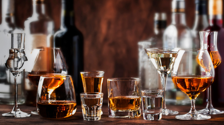 Assorted spirits in glasses