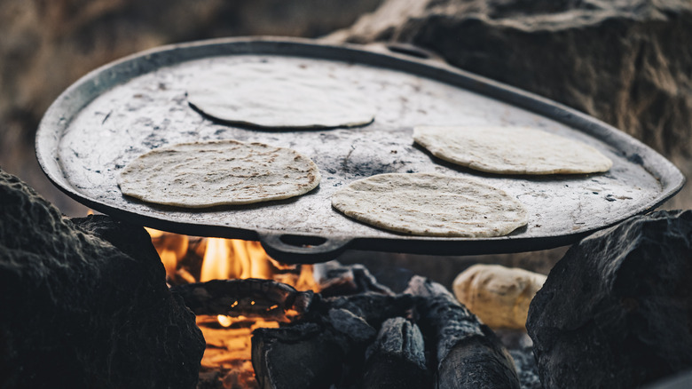 handmade tortillas cooked on comal