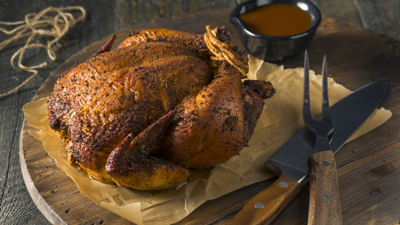 Smoked whole chicken ready for carving