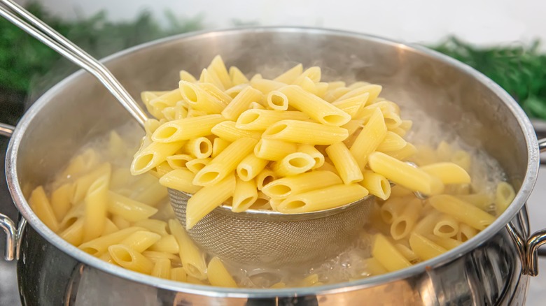 Pasta emerging from boiling water