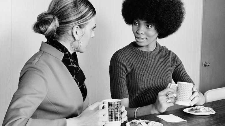 Two U.S. women speaking in 1970s