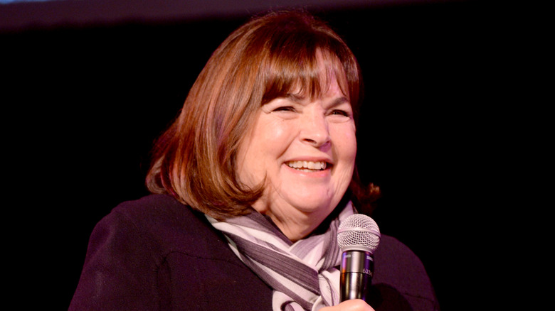 Ina Garten smiling into a microphone