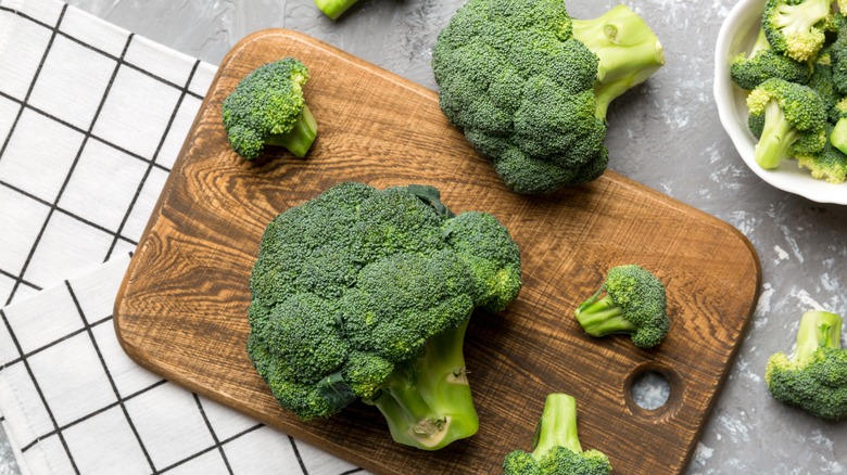 broccoli on wooden chopping board