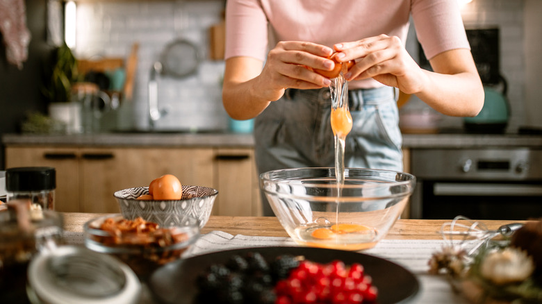 Woman making a cake in her kitchen