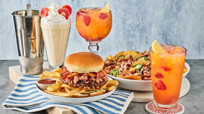 Red Robin's new line-up of menu items, including a new burger, nachos, two drinks, and a milkshake