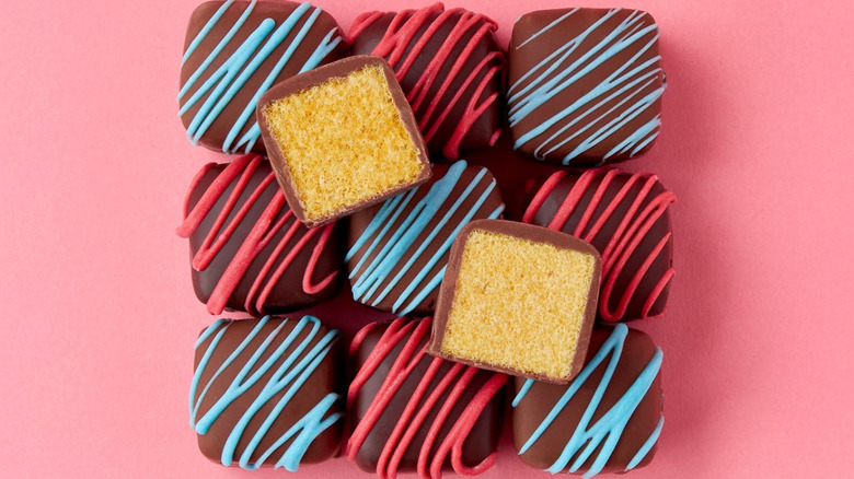 sponge candy coated in chocolate, sitting in a square pile