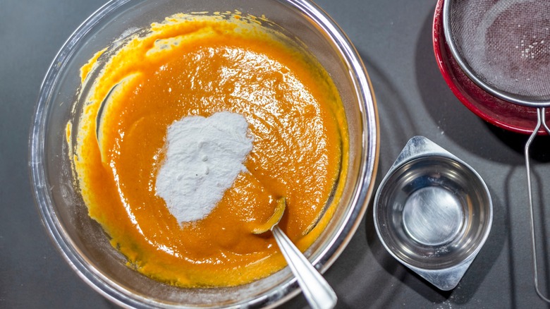 carrot cake batter in a clear bowl