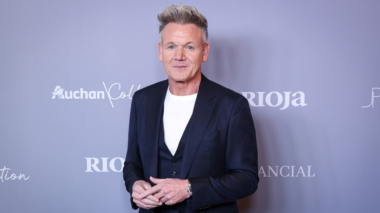 Gordon Ramsay poses at an event.