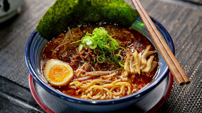 bowl of ramen with chopsticks