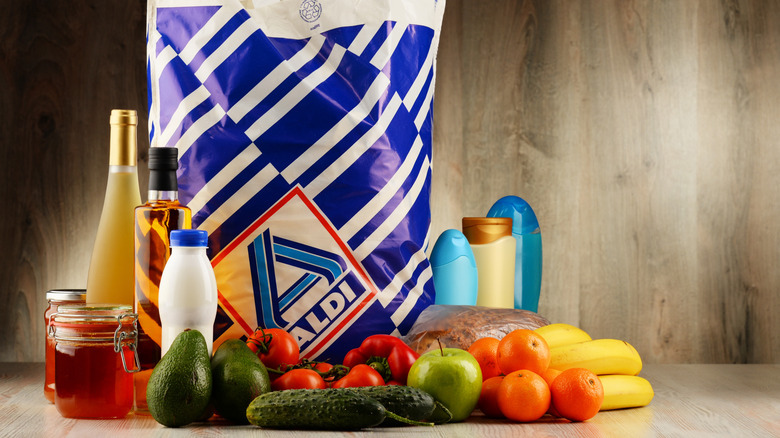 An Aldi shopping bag surrounded by various products