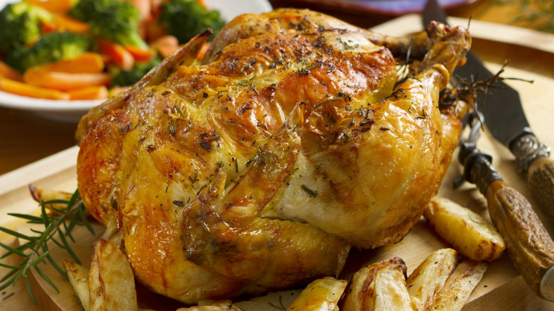 roast chicken on carving board