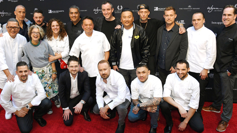 Various celebrity chefs pose at an event in Las Vegas