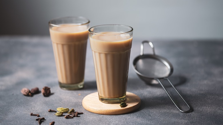 Two glass cups of homemade chai latte.