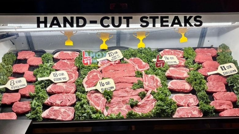 Texas Roadhouse raw steaks display case