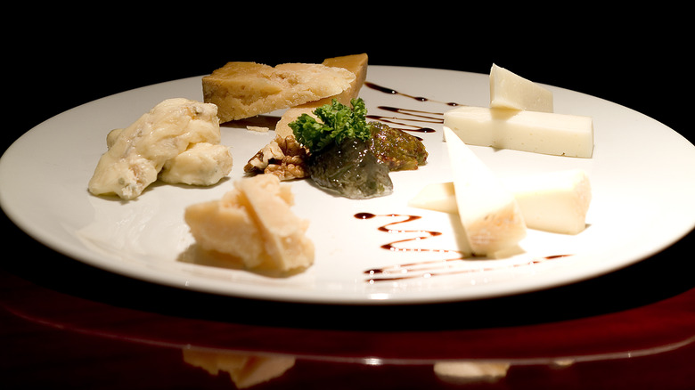 Selection of cheeses on plate