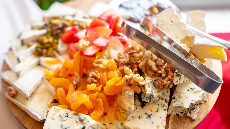 Cheese board with dried fruits