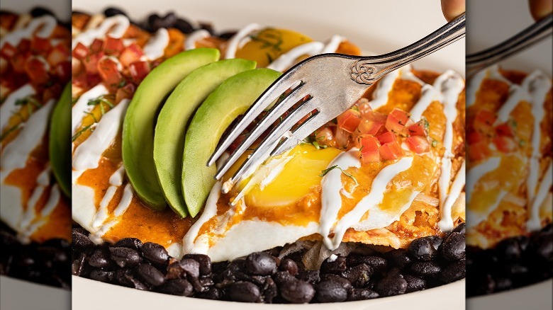 Factory huevos rancheros with fresh avocado