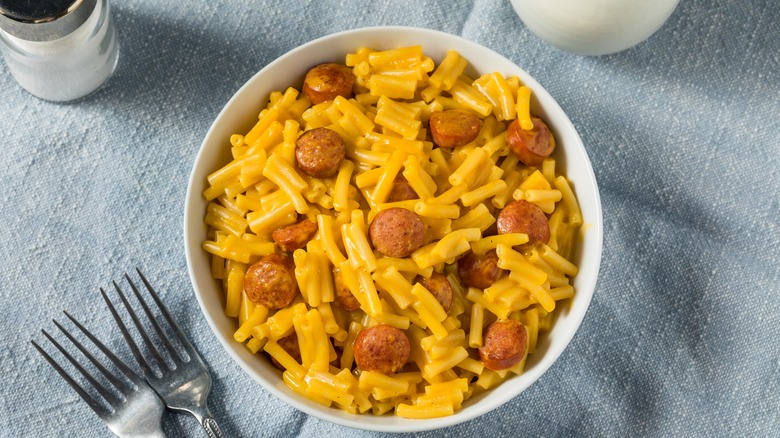Hot dog mac and cheese in a white bowl