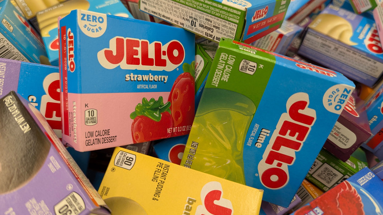 A stack of jell-o boxes in all kinds of flavors