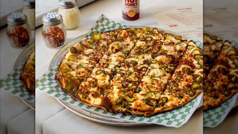 Tavern-style pizza from Pizz'amici with jalapeños.