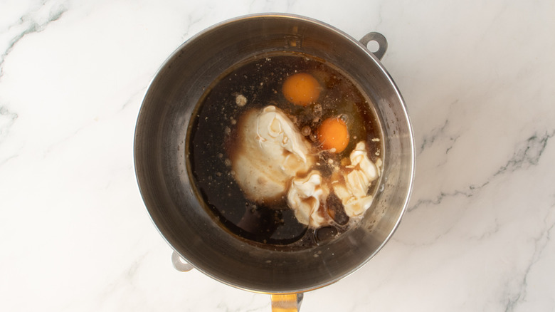 various wet ingredients in a metal bowl