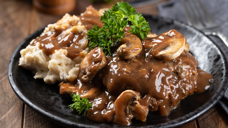 Salisbury steak served on a plate
