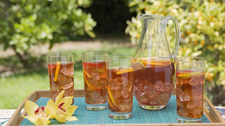 glasses of iced tea and a pitcher 