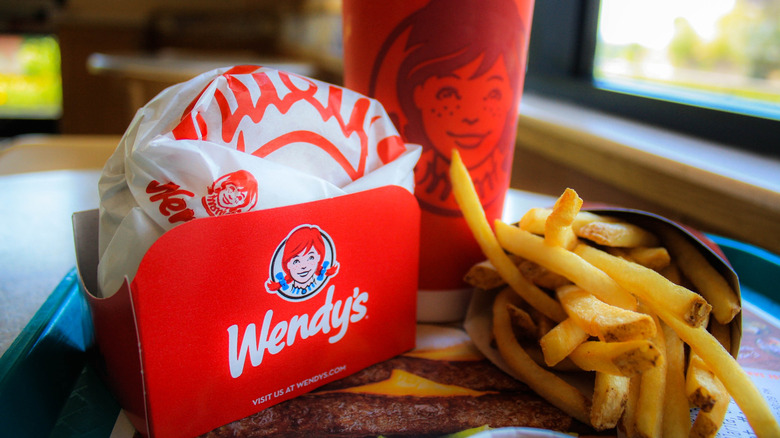 A Wendy's meal with fries and a drink.
