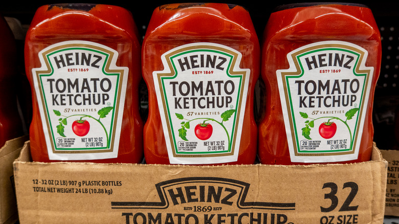 bottles of ketchup on store shelf