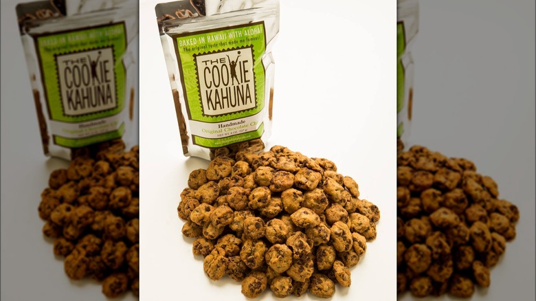 A pile of cookies next to a bag of The Cookie Kahuna