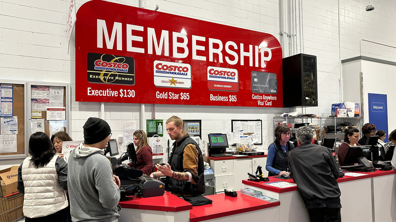 People signing up for a Costco membership