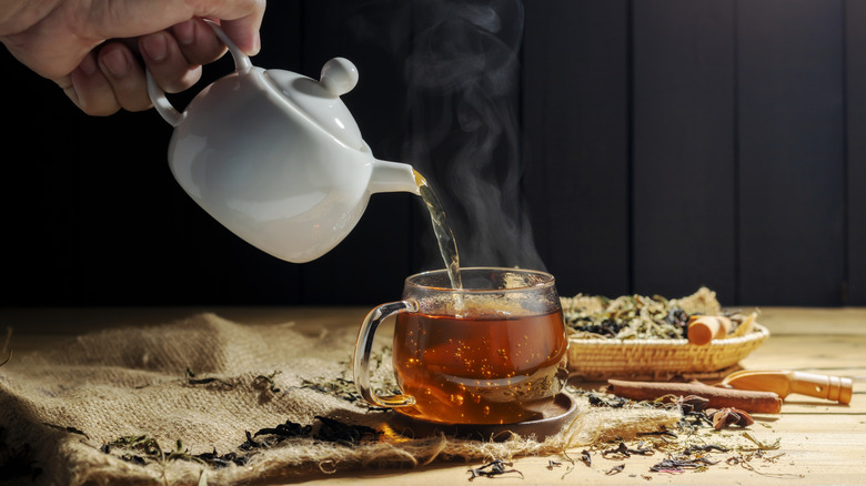 Tea being poured into cup