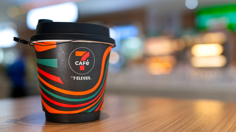A 7-Eleven café cup.