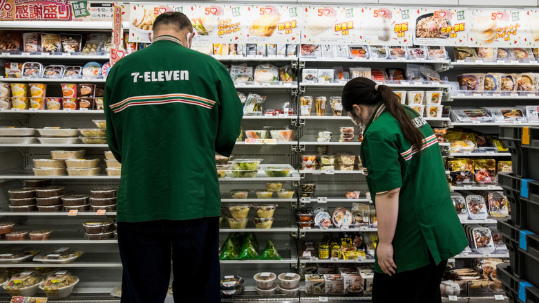 Employees in a Japanese 7-Eleven.