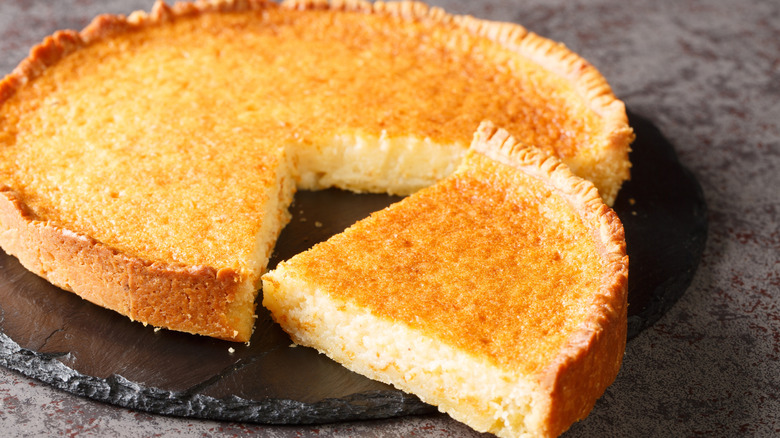Southern buttermilk pie with a slice taken out