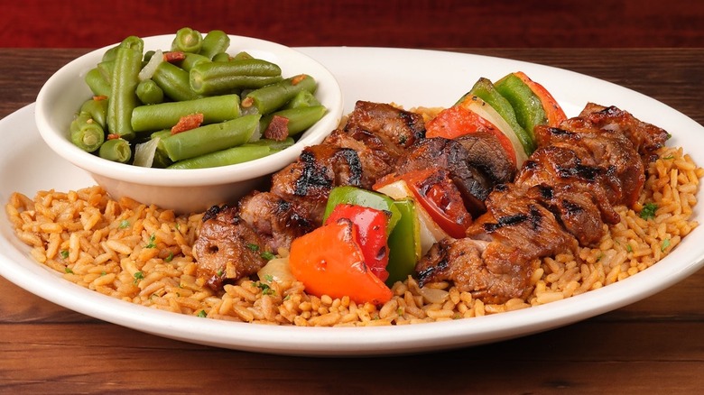 Texas Roadhouse steak kabobs with sides