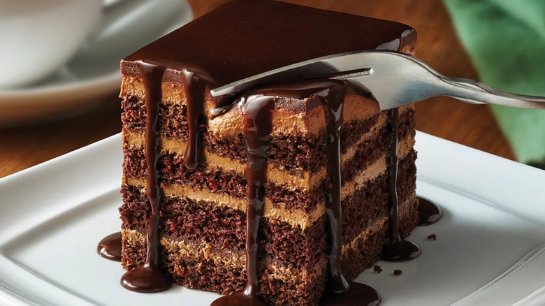 Olive Garden Chocolate Lasagna with fork on white plate