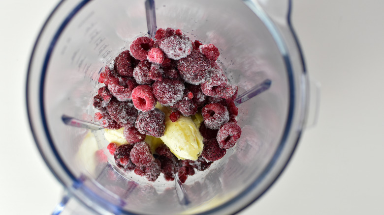 Frozen fruit in a blender