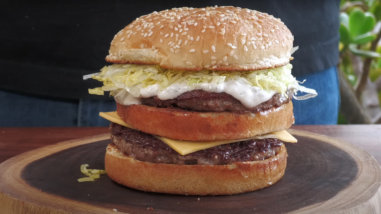 A recreation of Winky's Hamburgers Big Wink Burger on a wooden surface