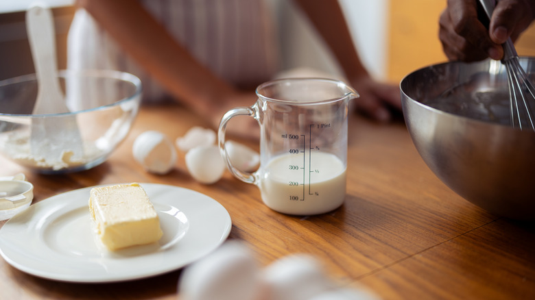 eggs, butter, and milk on a table