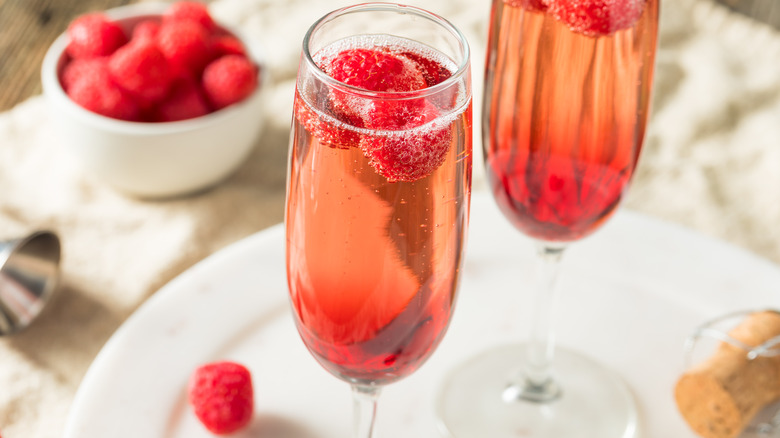 Kir Royale cocktails with raspberries