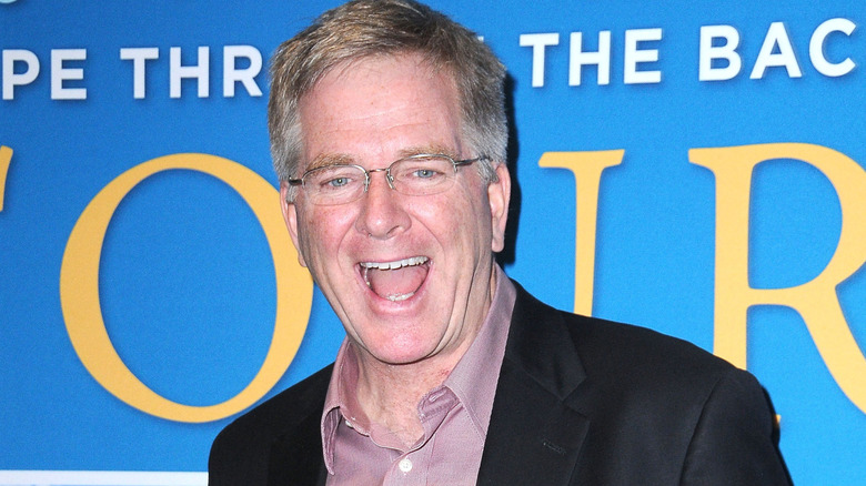 Rick Steves smiling on his tour