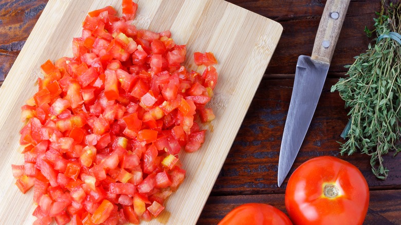 Diced tomatoes on cutting board