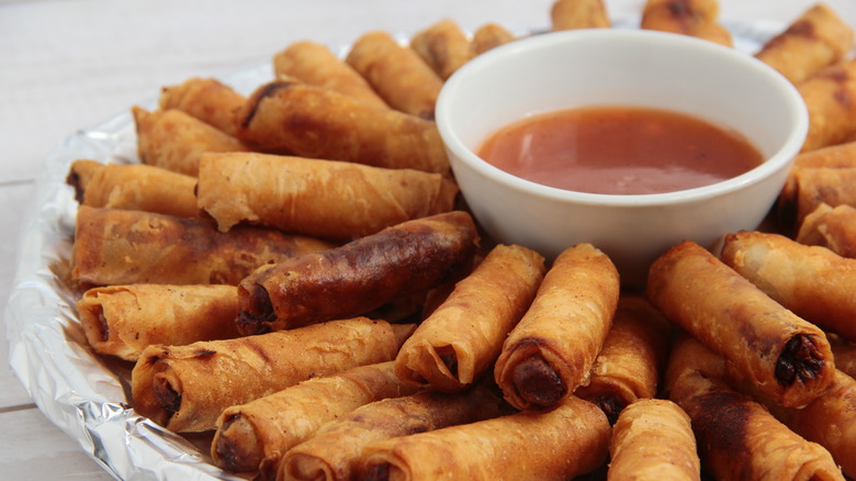 Platter of Filipino lumpia and dipping sauce
