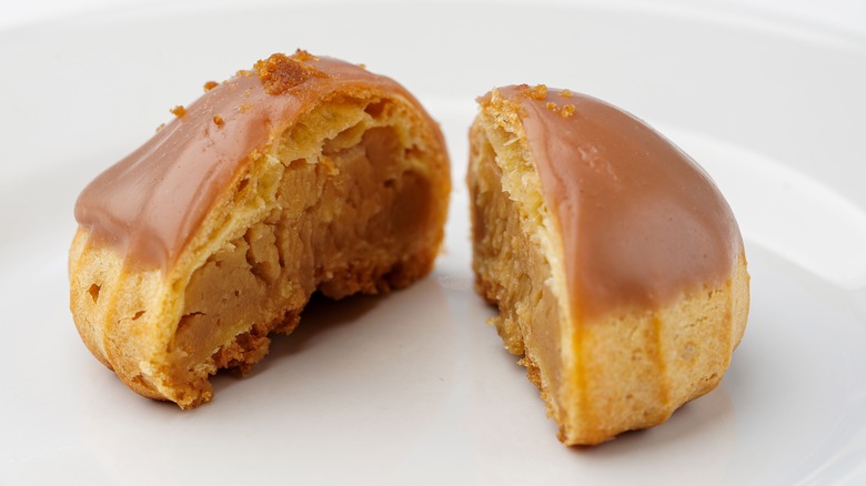 A choux bun dipped in caramel.