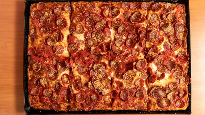 Sicilian-style pepperoni pizza in pan