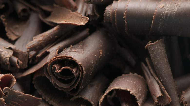 Shavings of dark chocolate in a pile