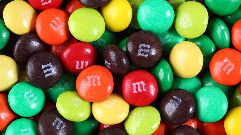 A large pile of differently colored M&Ms