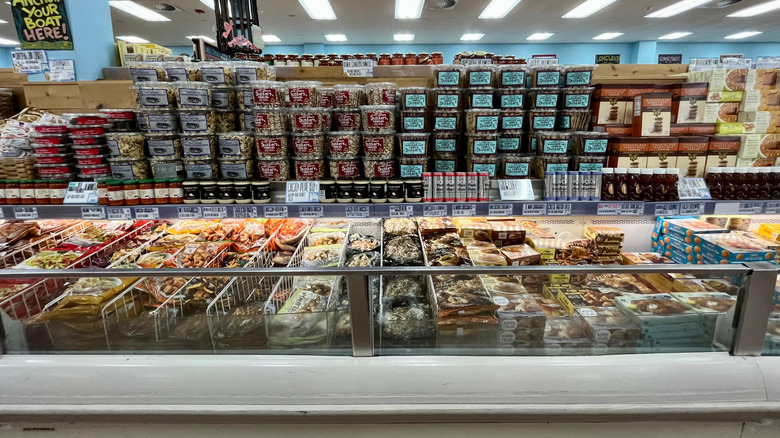 A Trader Joe's freezer aisle gleams under the lights