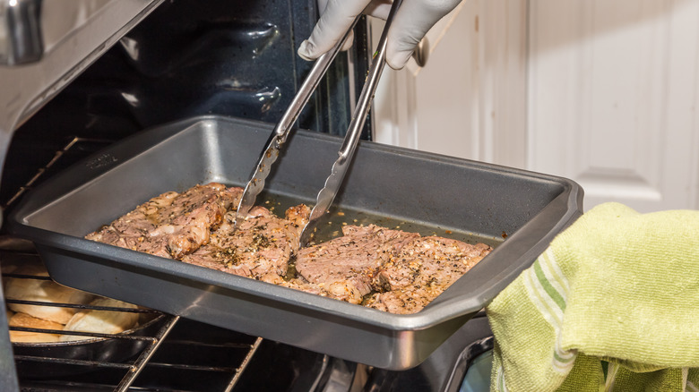 flipping steaks in an oven